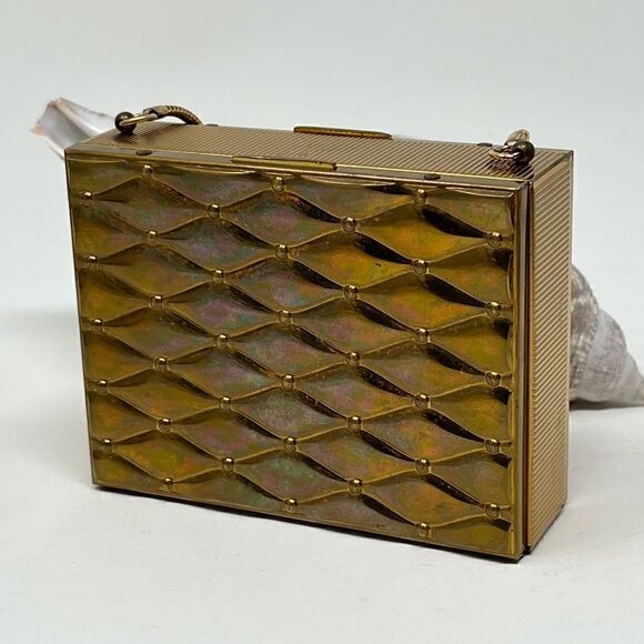 Vintage, gold tone compact/purse.  